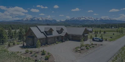 A beautiful mountain home in Pagosa Springs featuring clear, fire-mitigated landscaping and excellent driveway access.